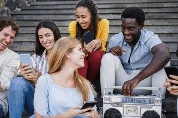 a group of people listening to radio 